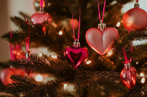 Valentines Day tree with heart-shaped ornaments.