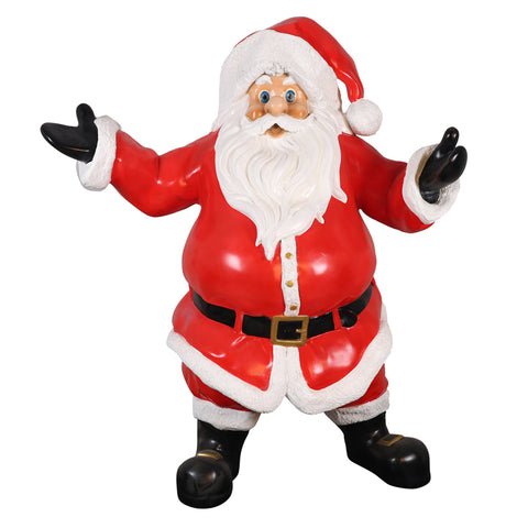 A statue of Santa Claus in his traditional red suit and hat, with white trim, black boots, and a black belt, has arms raised and an open-mouthed expression.