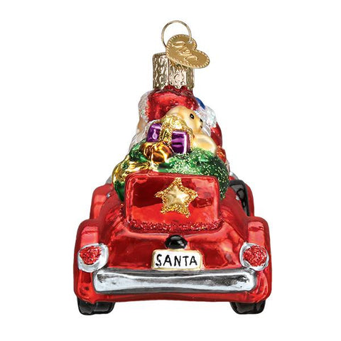 Santa in Antique Car Glass Ornament