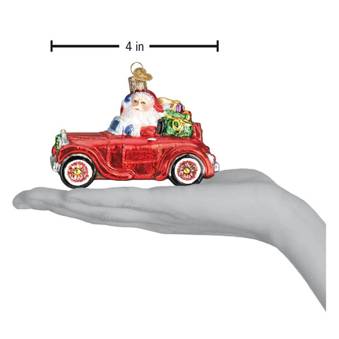 Santa in Antique Car Glass Ornament