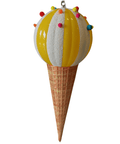 A whimsical ornament shaped like an ice cream cone, featuring a yellow and white striped spherical scoop topped with colorful pom-poms. The cone has a textured brown waffle design and a loop at the top for hanging. Perfect for adding a touch of spring and summer charm to your seasonal decor, the ACRO 26" Ice Cream Jumbo Finial is an eye-catching addition to any space.