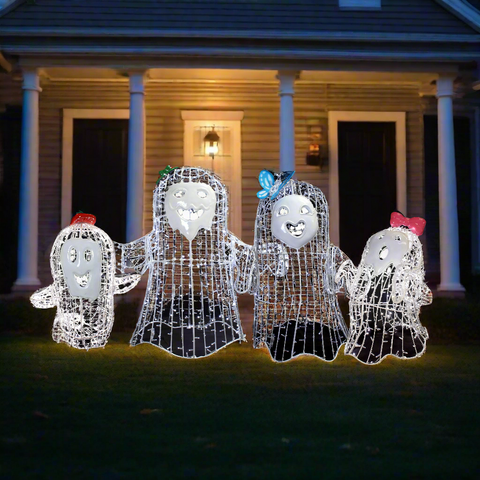 Family of ghosts in front of the house