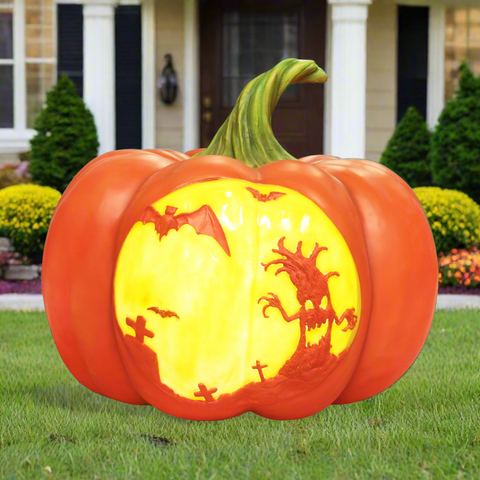 Pumpkin with spooky witch and bats design in yellow